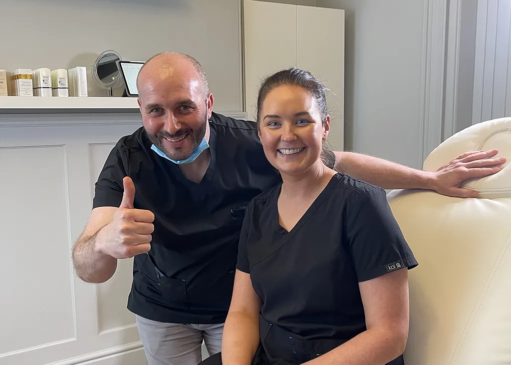 Dr Cormac Lynch celebrating with a delegate after training